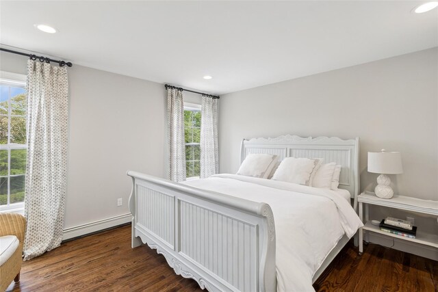 38 Savanna Cir, Mount Sinai, NY 11766 - bedroom with a baseboard radiator, recessed lighting, and wood finished floors
