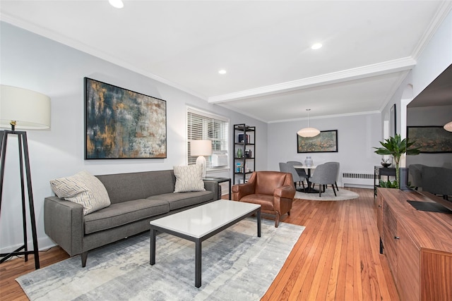 4 Peck Unit 47A, Rye, NY 10580 - living area with radiator heating unit, light wood-style floors, recessed lighting, beam ceiling, and crown molding