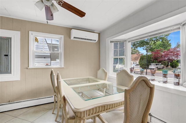 31 Clover Ln, Levittown, NY 11756 - dining space featuring an AC wall unit, a baseboard heating unit, a ceiling fan, light tile patterned floors, and wood walls
