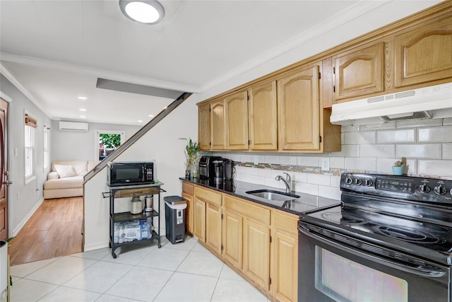 31 Clover Ln, Levittown, NY 11756 - kitchen featuring black appliances, under cabinet range hood, a sink, a wall unit AC, and decorative backsplash