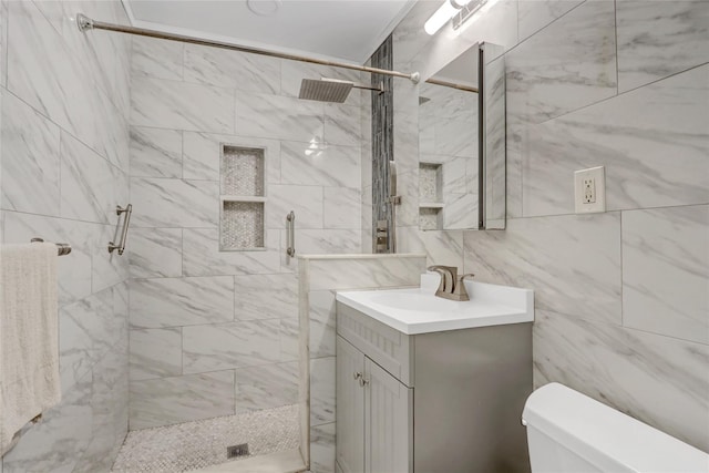 31 Clover Ln, Levittown, NY 11756 - bathroom with a shower stall, vanity, toilet, and tile walls
