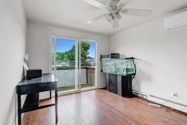 31 Clover Ln, Levittown, NY 11756 - office area with a wall unit AC, wood finished floors, a ceiling fan, and baseboard heating