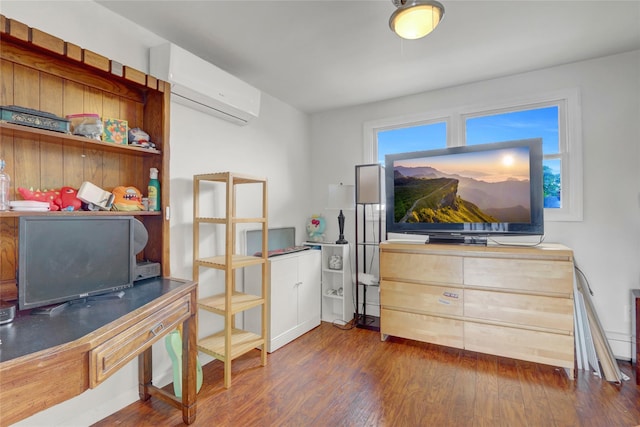 31 Clover Ln, Levittown, NY 11756 - bedroom featuring a wall mounted air conditioner and wood finished floors
