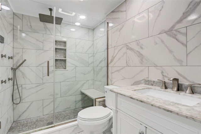 31 Clover Ln, Levittown, NY 11756 - full bathroom with a stall shower, toilet, tile walls, vanity, and marble look tile flooring