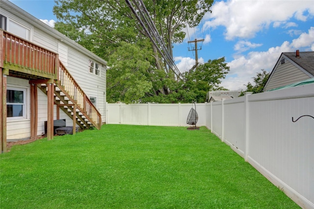 31 Clover Ln, Levittown, NY 11756 - view of yard featuring stairs and a wooden deck