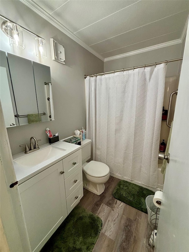 150 Rinaldi Blvd Unit 1C, Poughkeepsie, NY 12601 - bathroom featuring ornamental molding, wood finished floors, toilet, and vanity
