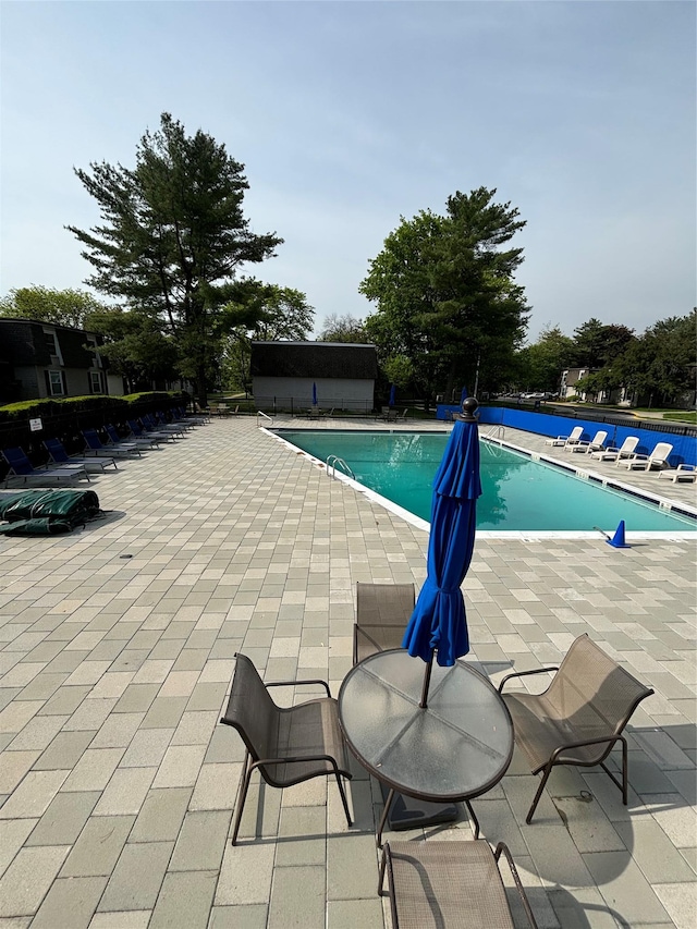 150 Rinaldi Blvd Unit 1C, Poughkeepsie, NY 12601 - community pool featuring a patio