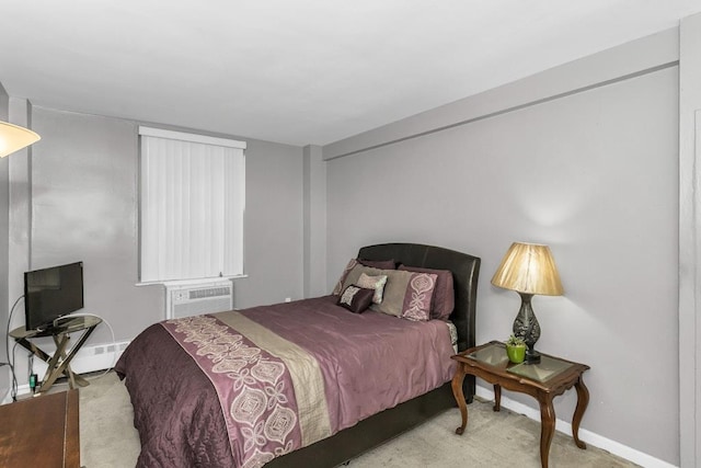 12427 Flatlands Ave Unit 1A, Brooklyn, NY 11208 - bedroom with carpet floors, baseboards, and a wall unit AC