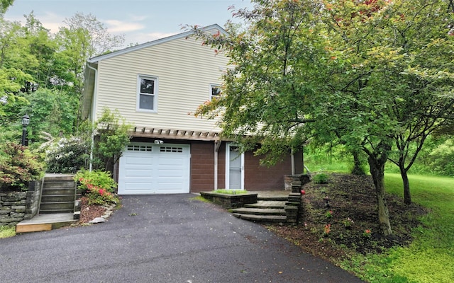 9 Chapel Rd, Newburgh, NY 12550 - view of front of property with a garage and driveway