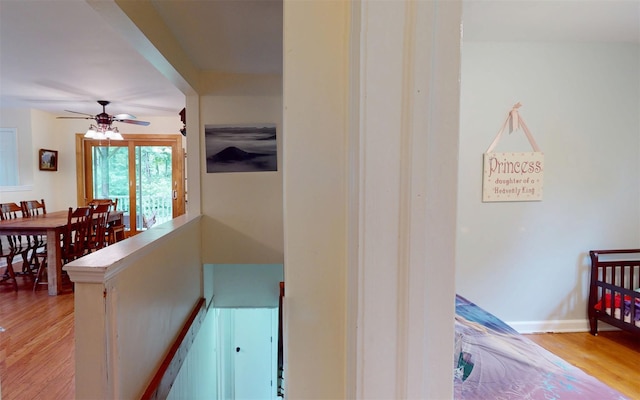 9 Chapel Rd, Newburgh, NY 12550 - corridor featuring light wood finished floors, an upstairs landing, and baseboards