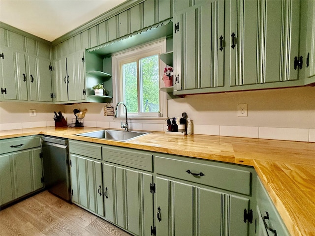 9 Chapel Rd, Newburgh, NY 12550 - kitchen with stainless steel dishwasher, a sink, green cabinetry, open shelves, and butcher block countertops