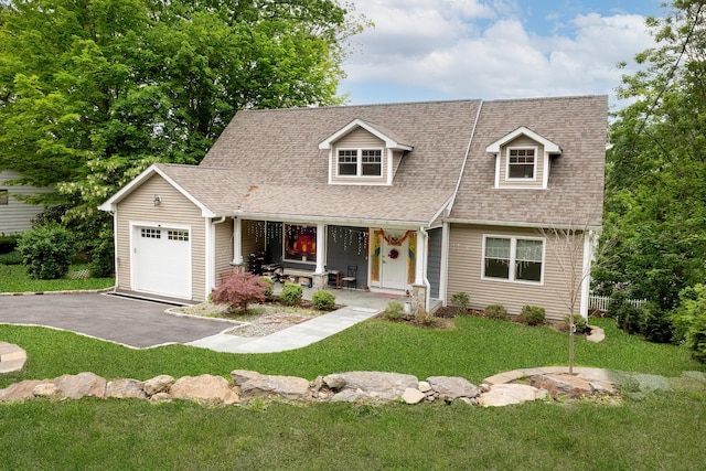 5 Teramar Way, White Plains, NY 10607 - new england style home featuring covered porch, a garage, a shingled roof, a front yard, and driveway