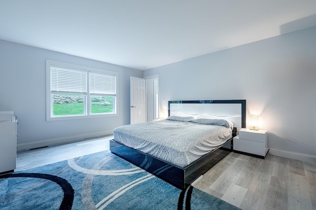 5 Teramar Way, White Plains, NY 10607 - bedroom with baseboards and wood finished floors