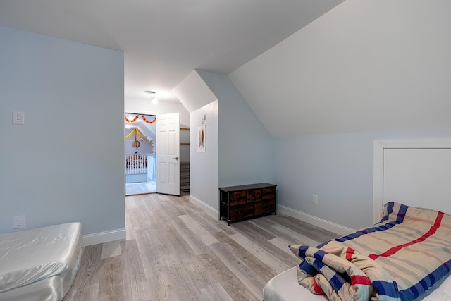5 Teramar Way, White Plains, NY 10607 - bedroom featuring light wood-type flooring, baseboards, and vaulted ceiling