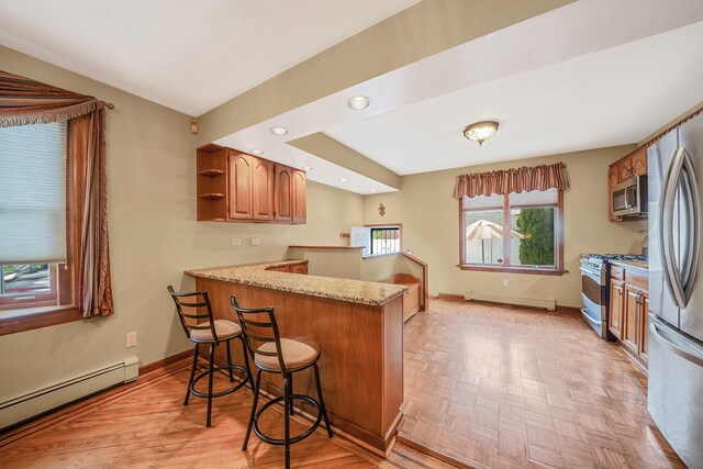 79-48 67th Rd, Middle Village, NY 11379 - kitchen featuring stainless steel appliances, a baseboard radiator, a baseboard heating unit, open shelves, and a peninsula
