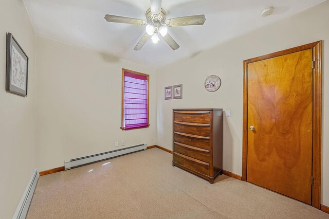 79-48 67th Rd, Middle Village, NY 11379 - bedroom featuring a baseboard radiator, light colored carpet, baseboards, and ceiling fan