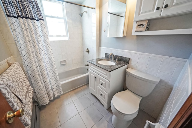 79-48 67th Rd, Middle Village, NY 11379 - full bathroom featuring tile walls, toilet, shower / bath combo, vanity, and tile patterned floors