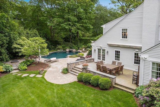 35 Seville Ave, Rye, NY 10580 - outdoor pool with a yard, a patio area, outdoor dining area, and an outdoor fire pit
