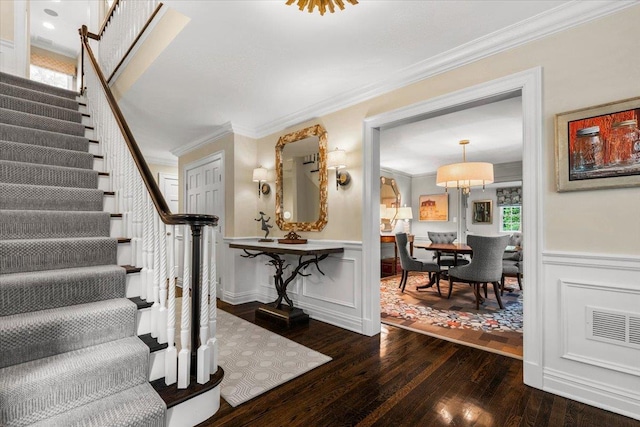 35 Seville Ave, Rye, NY 10580 - stairs featuring hardwood / wood-style flooring, ornamental molding, wainscoting, and a decorative wall