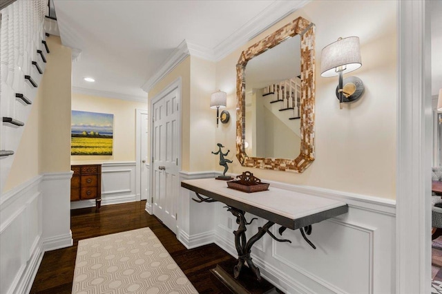 35 Seville Ave, Rye, NY 10580 - hallway featuring dark wood-type flooring, a decorative wall, wainscoting, ornamental molding, and recessed lighting