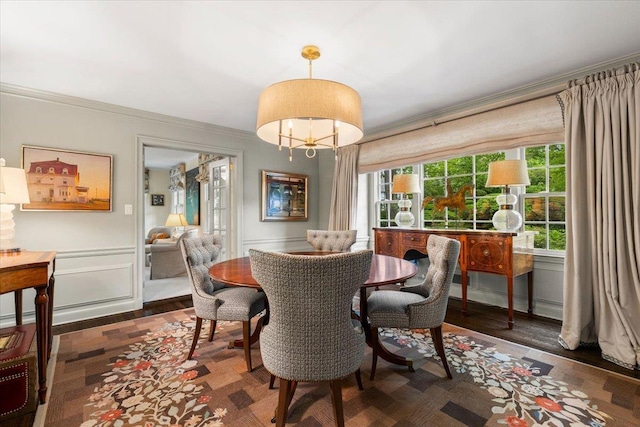 35 Seville Ave, Rye, NY 10580 - dining space with ornamental molding, wood finished floors, a chandelier, and wainscoting