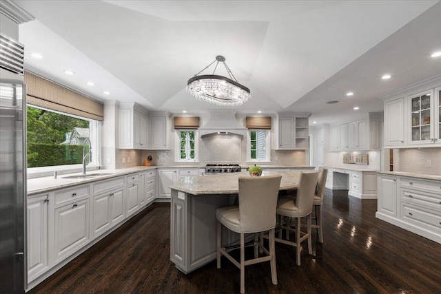 35 Seville Ave, Rye, NY 10580 - kitchen with a sink, range, lofted ceiling, open shelves, and dark wood finished floors