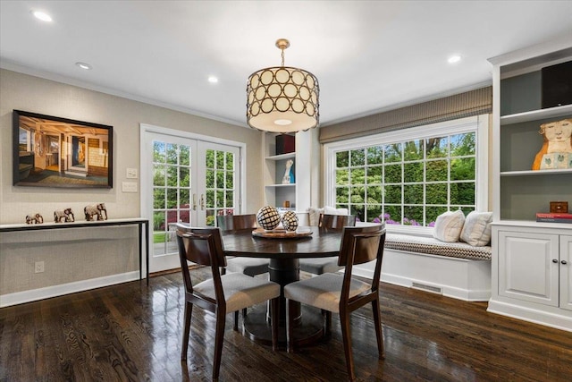 35 Seville Ave, Rye, NY 10580 - dining room with crown molding, dark wood-style flooring, baseboards, french doors, and healthy amount of natural light