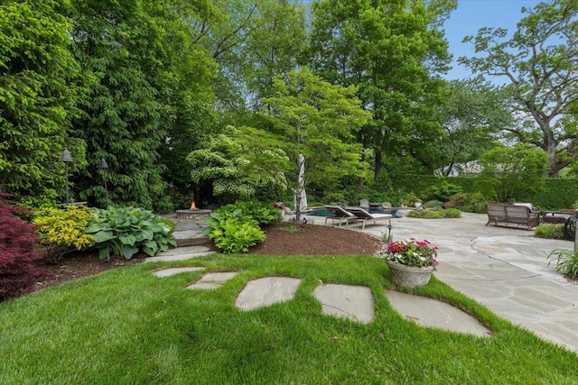 35 Seville Ave, Rye, NY 10580 - view of grassy yard with a patio area