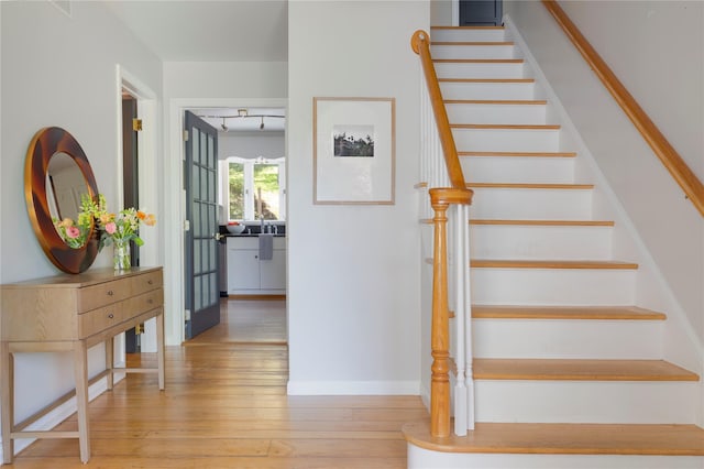 135 Turk Hill Rd, Carmel, NY 10509 - staircase with hardwood / wood-style floors and baseboards