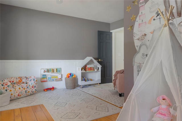 135 Turk Hill Rd, Carmel, NY 10509 - playroom featuring wainscoting and wood finished floors