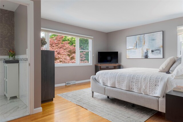 135 Turk Hill Rd, Carmel, NY 10509 - bedroom featuring light wood-type flooring and baseboards