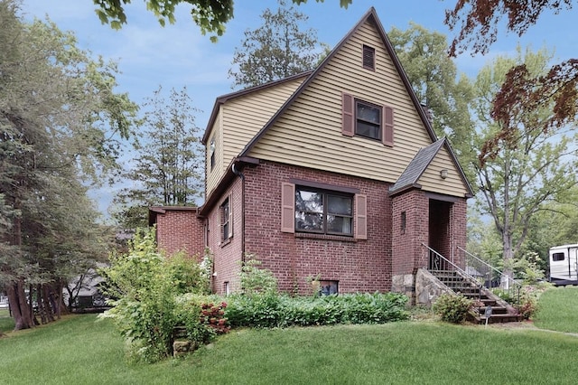 3 Byram Ridge Rd S, Armonk, NY 10504 - view of front of property featuring brick siding, a front lawn, and stairway