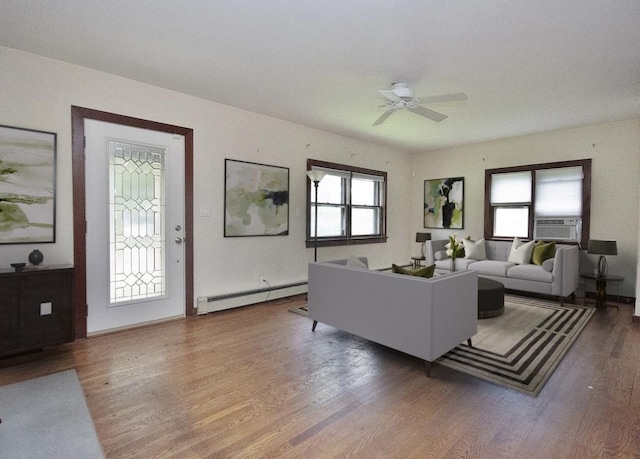 3 Byram Ridge Rd S, Armonk, NY 10504 - living room featuring baseboard heating, wood finished floors, cooling unit, and ceiling fan