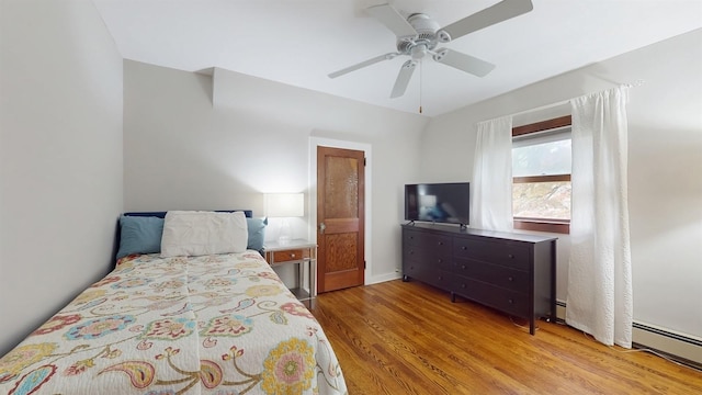 3 Byram Ridge Rd S, Armonk, NY 10504 - bedroom with light wood finished floors, baseboard heating, and ceiling fan