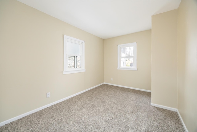 11-13 Eldridge Ln, Red Hook, NY 12571 - carpeted empty room with baseboards