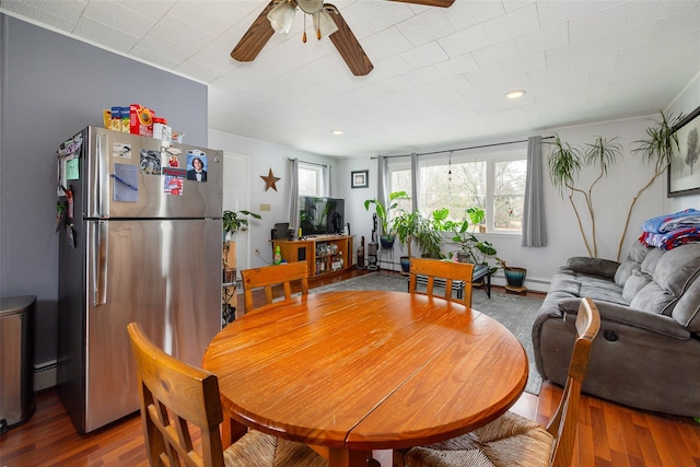 11-13 Eldridge Ln, Red Hook, NY 12571 - dining space with a ceiling fan, baseboard heating, wood finished floors, and recessed lighting