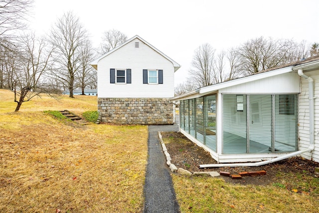 11-13 Eldridge Ln, Red Hook, NY 12571 - view of side of home featuring a sunroom