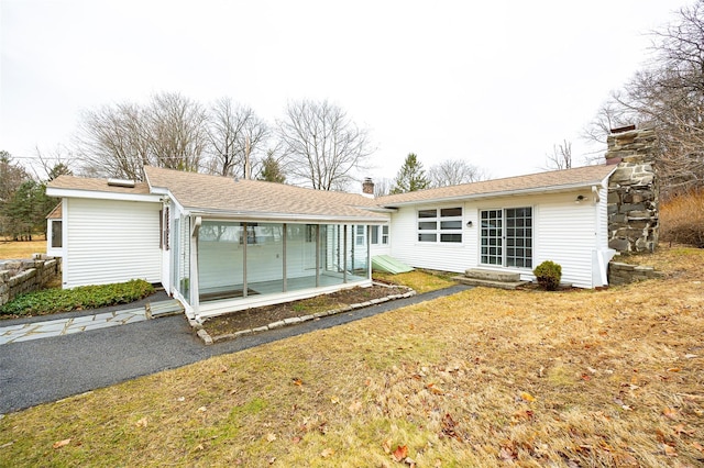 11-13 Eldridge Ln, Red Hook, NY 12571 - rear view of property with entry steps and a chimney