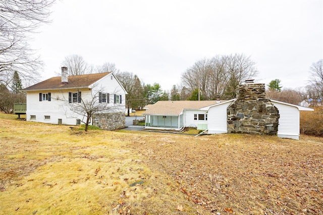 11-13 Eldridge Ln, Red Hook, NY 12571 - back of house with a chimney
