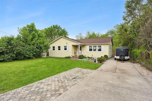 658 Northville Tpke, Riverhead, NY 11901 - view of front of property featuring a front yard and concrete driveway