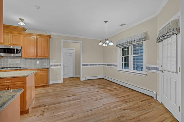 9 Joseph Bow Ct, Pearl River, NY 10965 - kitchen featuring stainless steel microwave, a chandelier, crown molding, light wood finished floors, and backsplash