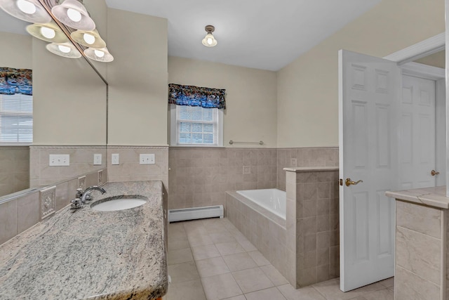 9 Joseph Bow Ct, Pearl River, NY 10965 - full bath with a baseboard heating unit, tile walls, tile patterned floors, a garden tub, and vanity