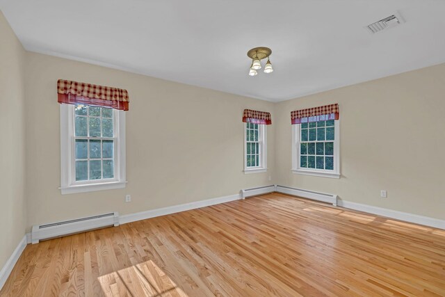 9 Joseph Bow Ct, Pearl River, NY 10965 - unfurnished room featuring baseboard heating and wood finished floors