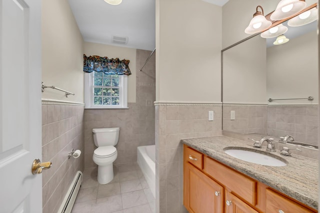 9 Joseph Bow Ct, Pearl River, NY 10965 - bathroom with tile walls, tile patterned flooring, vanity, bathing tub / shower combination, and wainscoting
