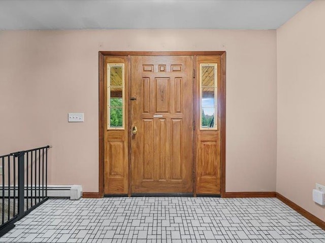 708 Kirbytown Rd, Middletown, NY 10940 - entrance foyer with baseboards and a baseboard radiator