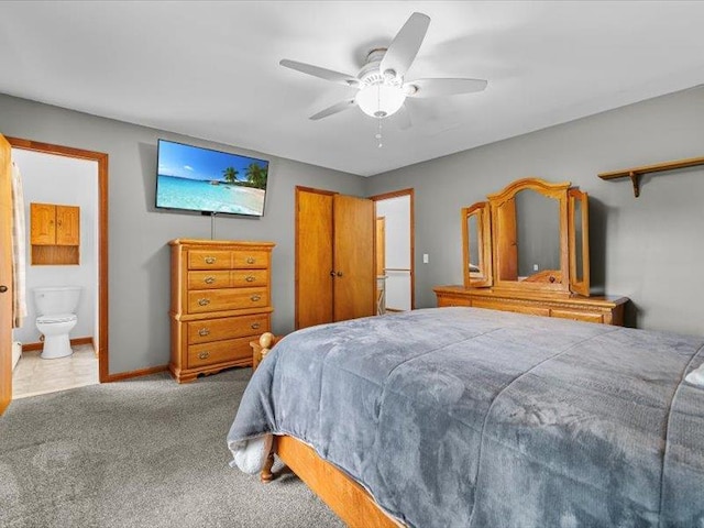 708 Kirbytown Rd, Middletown, NY 10940 - bedroom with carpet floors, baseboards, connected bathroom, and a ceiling fan