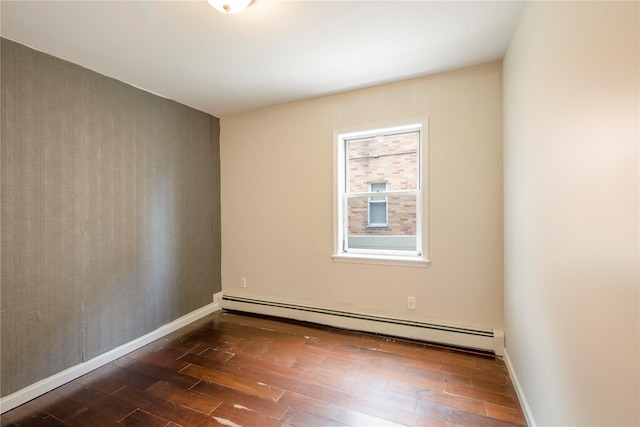 19623 56th Ave, Fresh Meadows, NY 11365 - spare room with a baseboard radiator and dark wood-type flooring