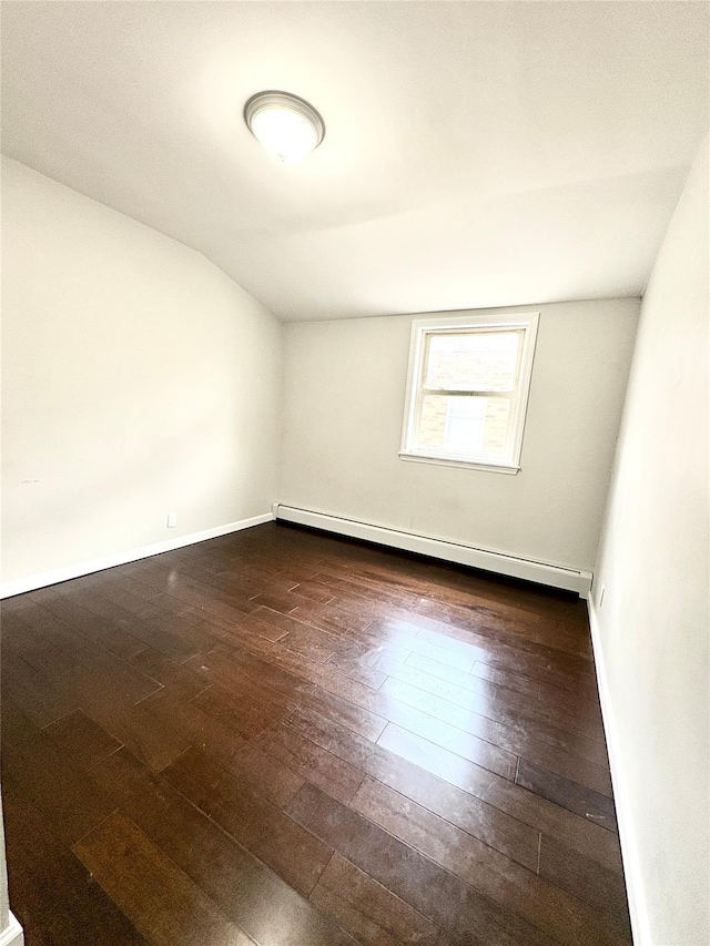 19623 56th Ave, Fresh Meadows, NY 11365 - empty room with a baseboard radiator and dark wood-style flooring