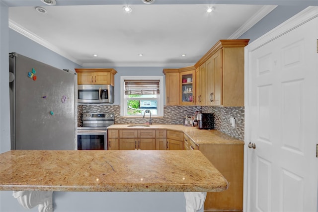 405 Miller Ave, Freeport, NY 11520 - kitchen with appliances with stainless steel finishes, a sink, backsplash, glass insert cabinets, and ornamental molding