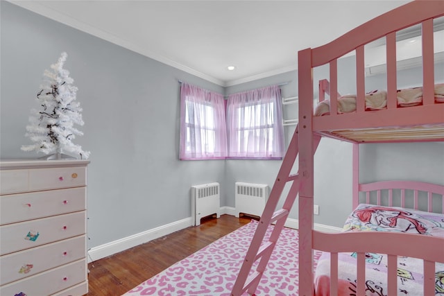 405 Miller Ave, Freeport, NY 11520 - bedroom with radiator, wood finished floors, ornamental molding, and baseboards